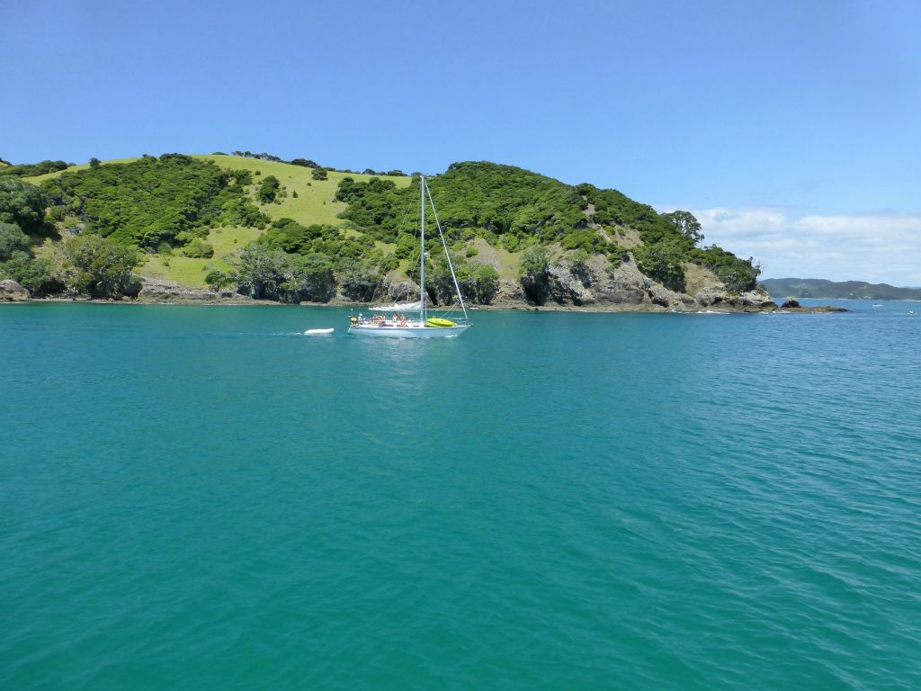 The renowned 'Hole in the Rock' cruise aboard Fullers.  Bay of Islands.